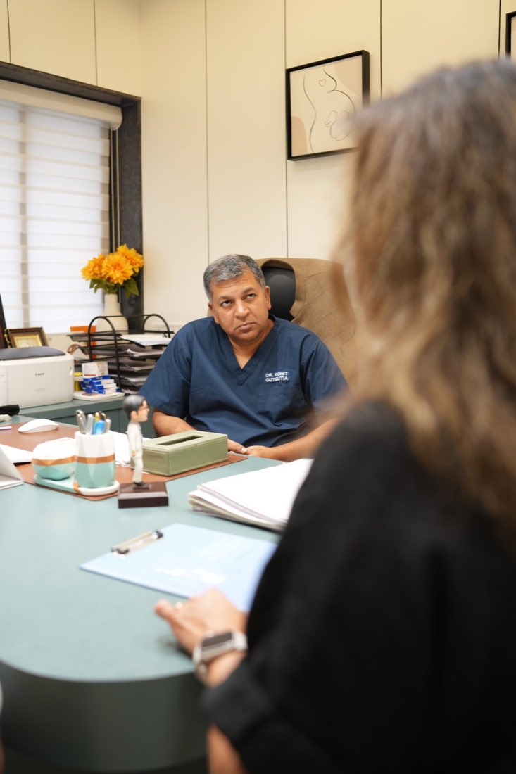 A patient in consultation with a senior fertility specialist